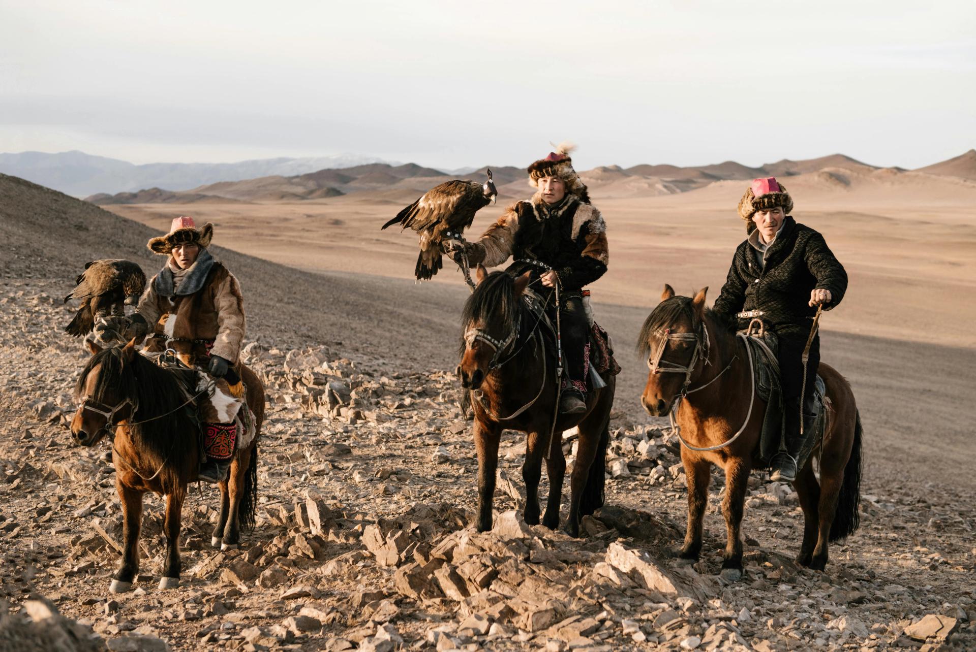 Tourists exploring the stunning landscapes of the Gobi Desert, a key attraction in Mongolia.